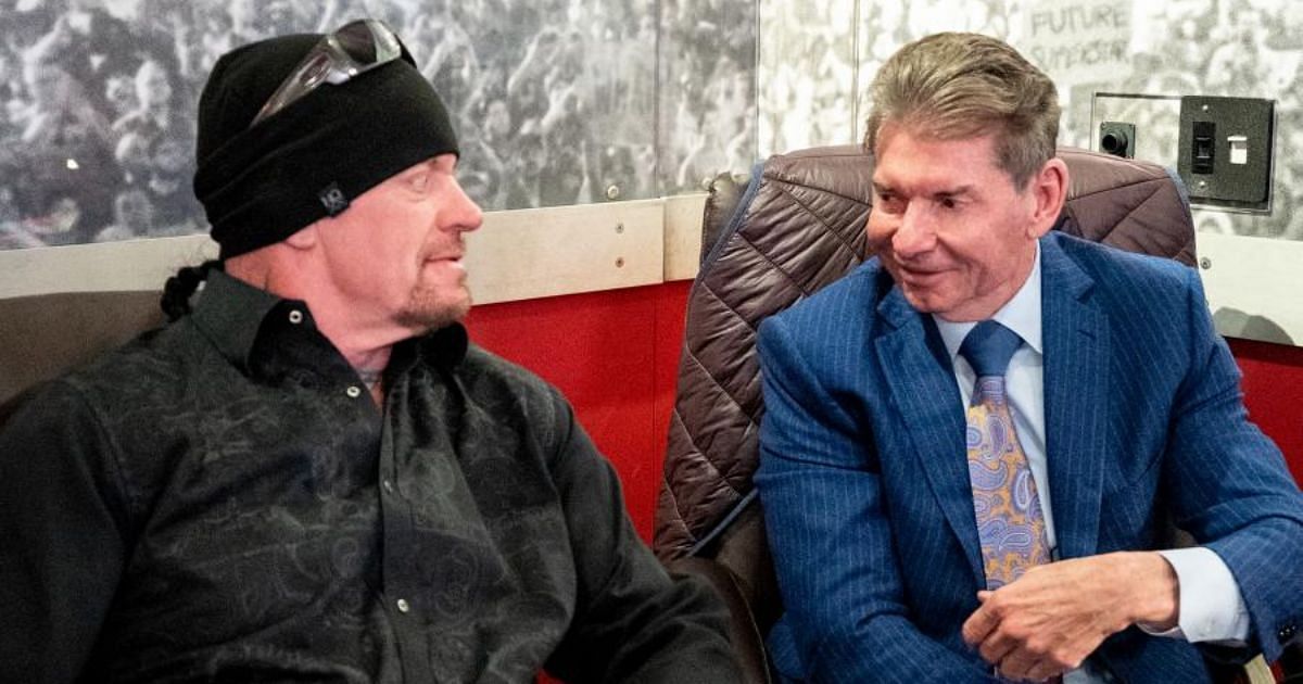 The Undertaker backstage with Vince McMahon.