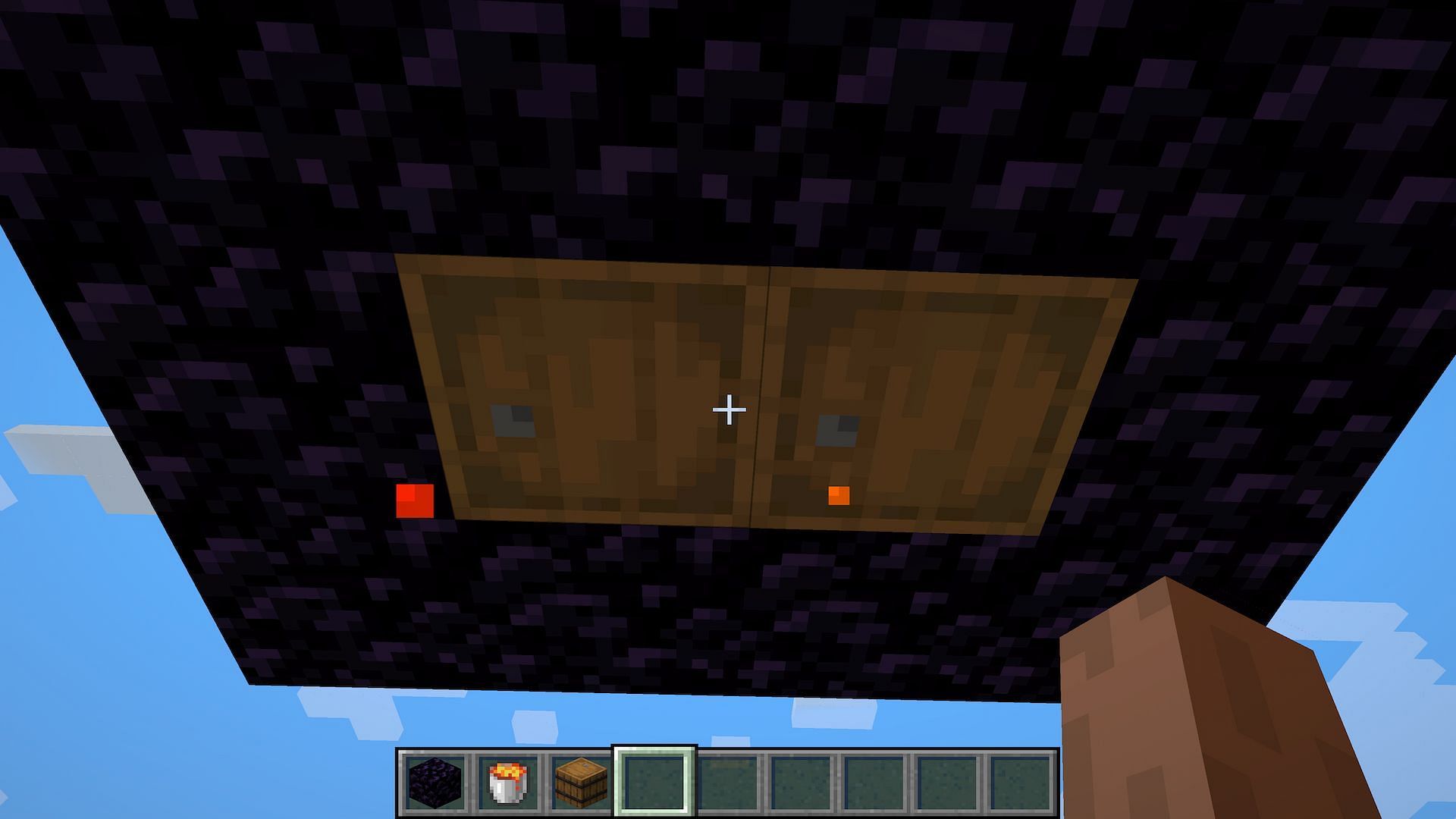 The lava will seem to drip through the barrels, but they will not burn (Image via Minecraft)