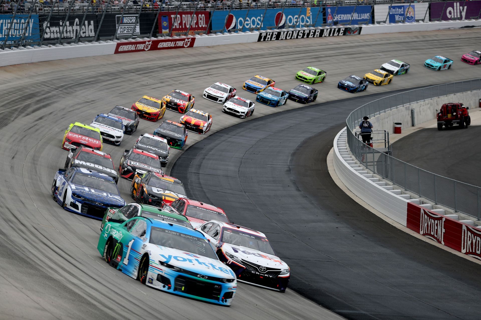 The field takes a pace car lap during the NASCAR Cup Series Drydene 400 at Dover International Speedway.