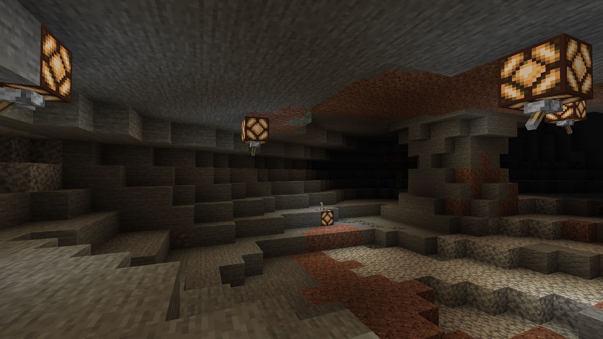 A cave lit with restone lamps (Image via Minecraft)