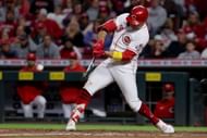 Joey Votto makes contact with a pitch during a Washington Nationals v Cincinnati Reds game