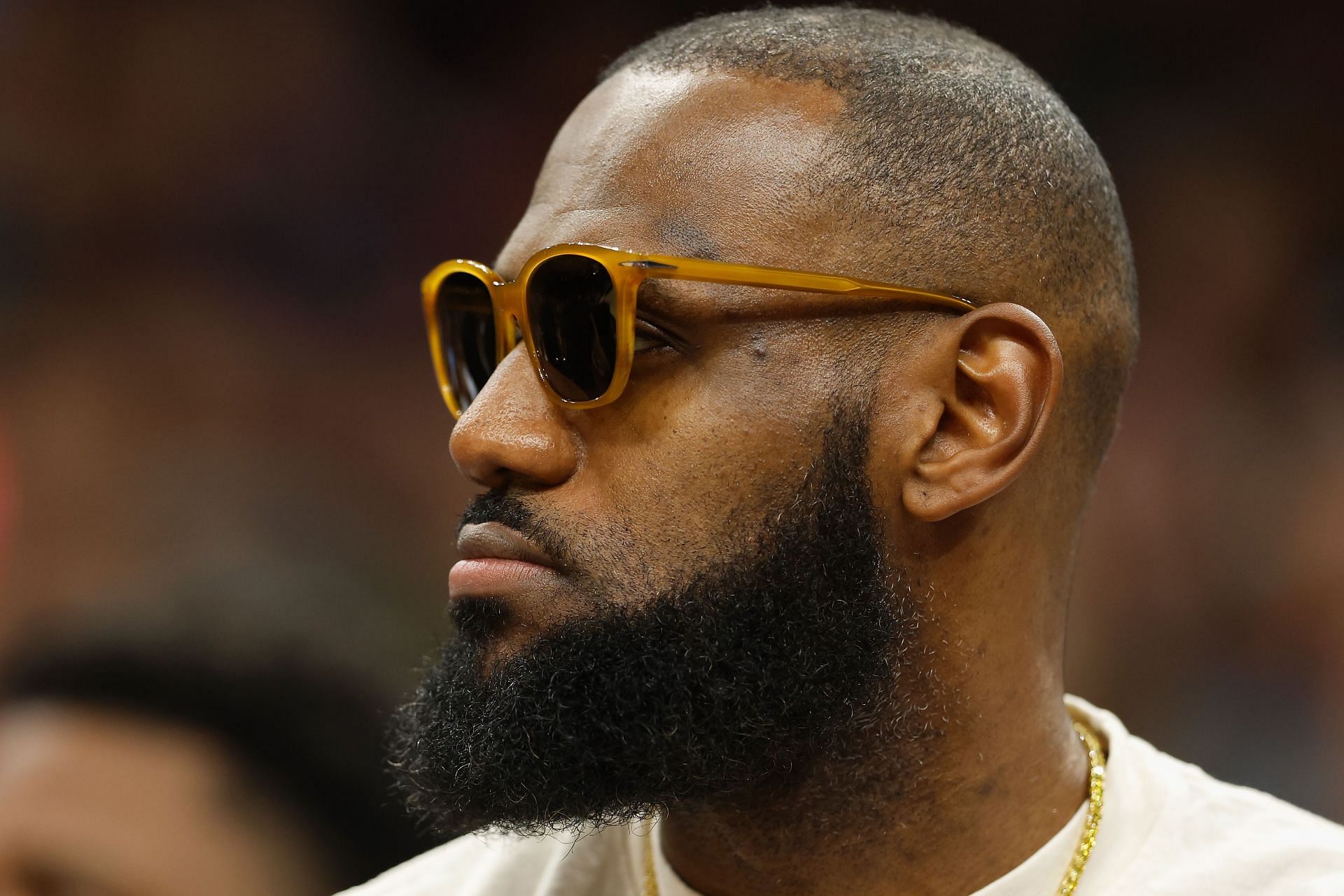 LeBron James of the LA Lakers watches from the bench during an NBA game against the Phoenix Suns on Tuesday in Phoenix, Arizona. The Suns defeated the Lakers 121-110.