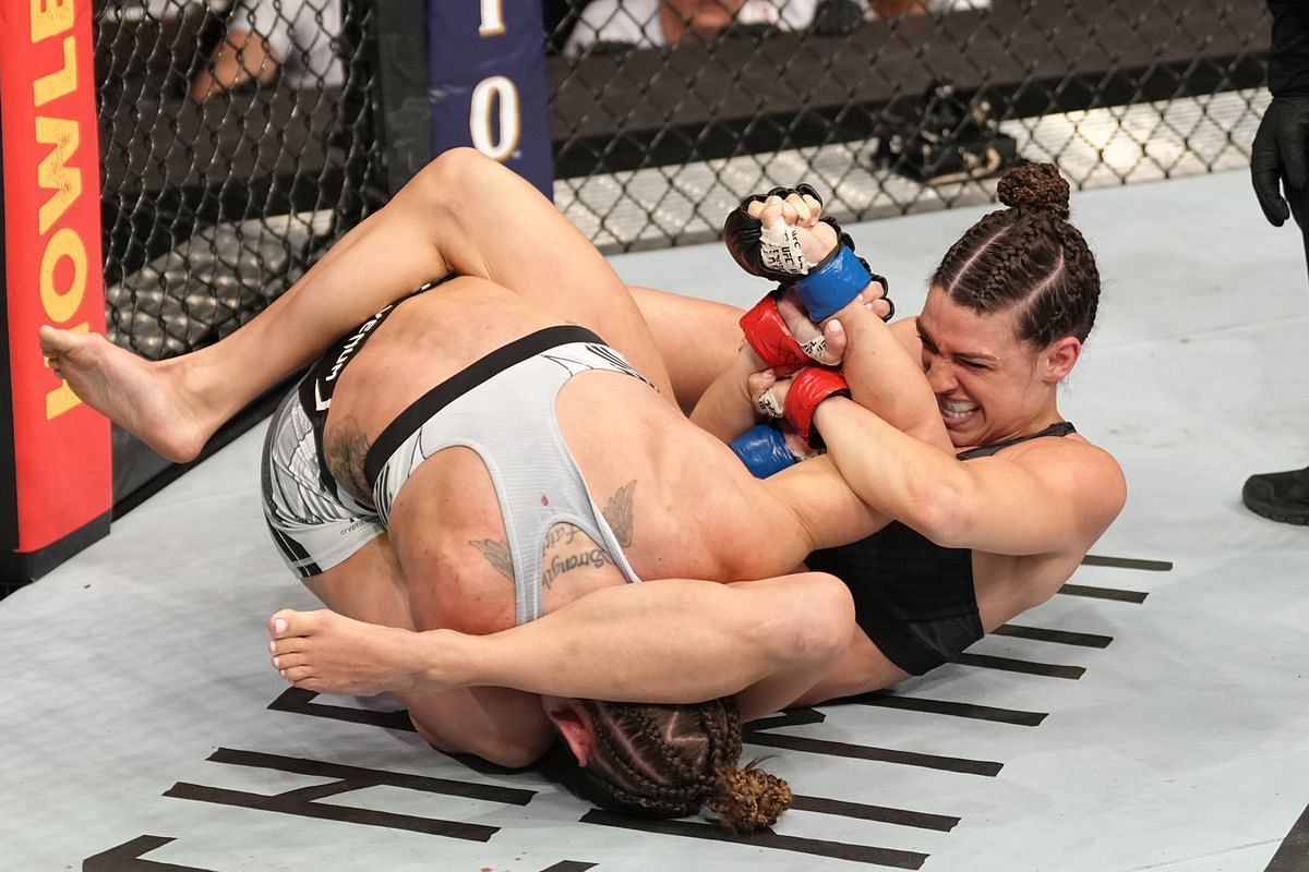 Mackenzie Dern edged out Tecia Torres to remain in title contention at strawweight