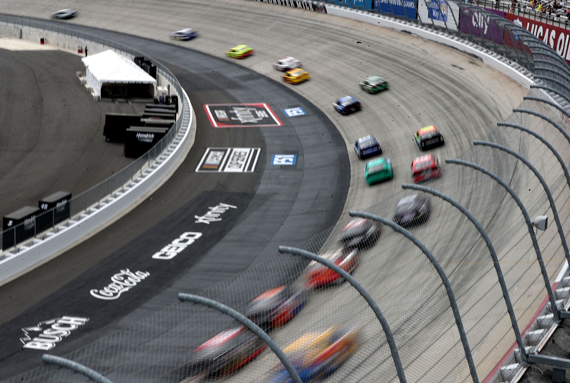 A general view of cars racing during the NASCAR Cup Series Drydene 400 at Dover International Speedway. (Photo by James Gilbert/Getty Images)