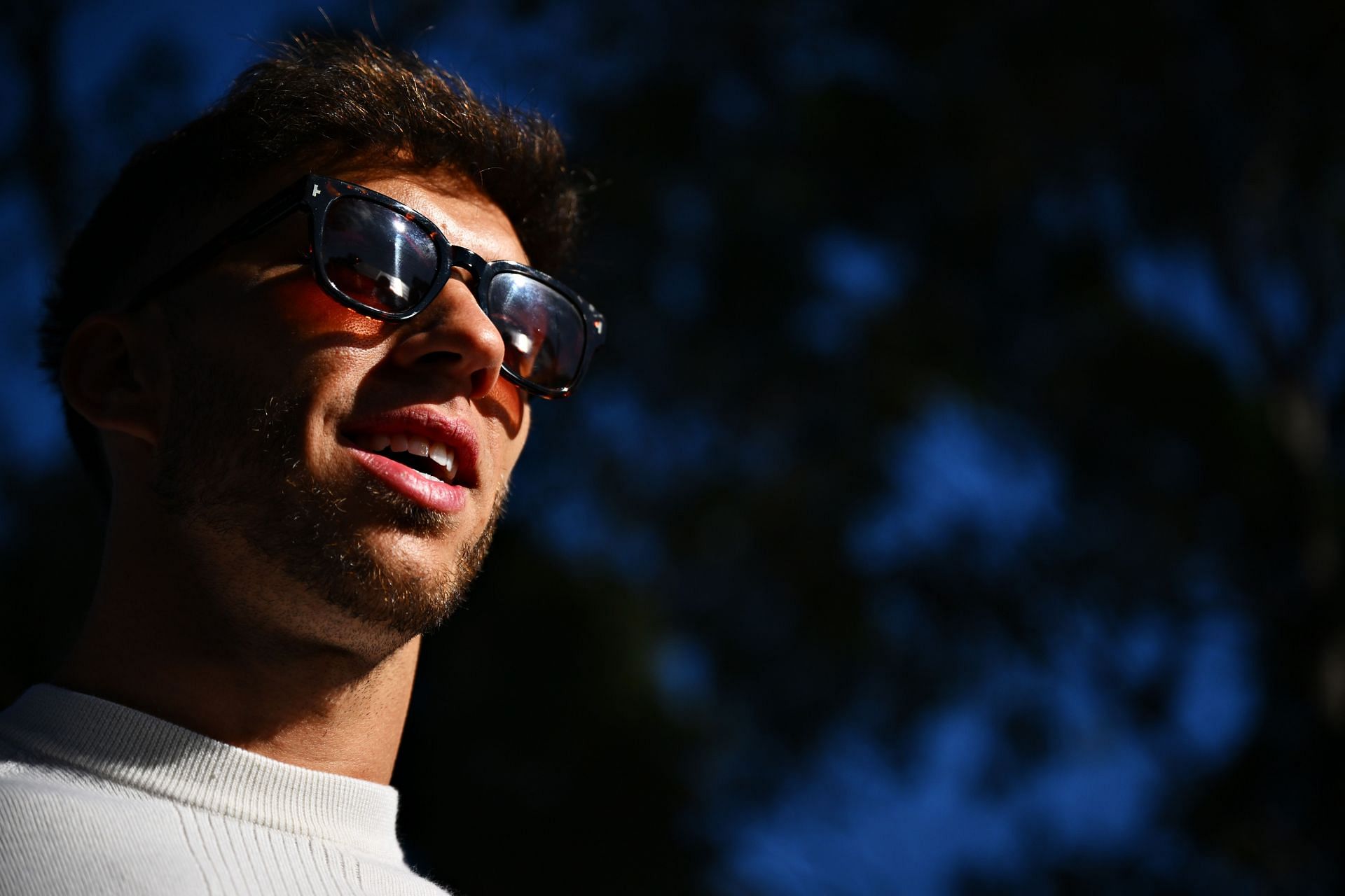 MELBOURNE, AUSTRALIA - APRIL 07: Pierre Gasly of France and Scuderia AlphaTauri looks on in the Paddock during previews ahead of the F1 Grand Prix of Australia at Melbourne Grand Prix Circuit on April 07, 2022 in Melbourne, Australia. (Photo by Clive Mason/Getty Images)