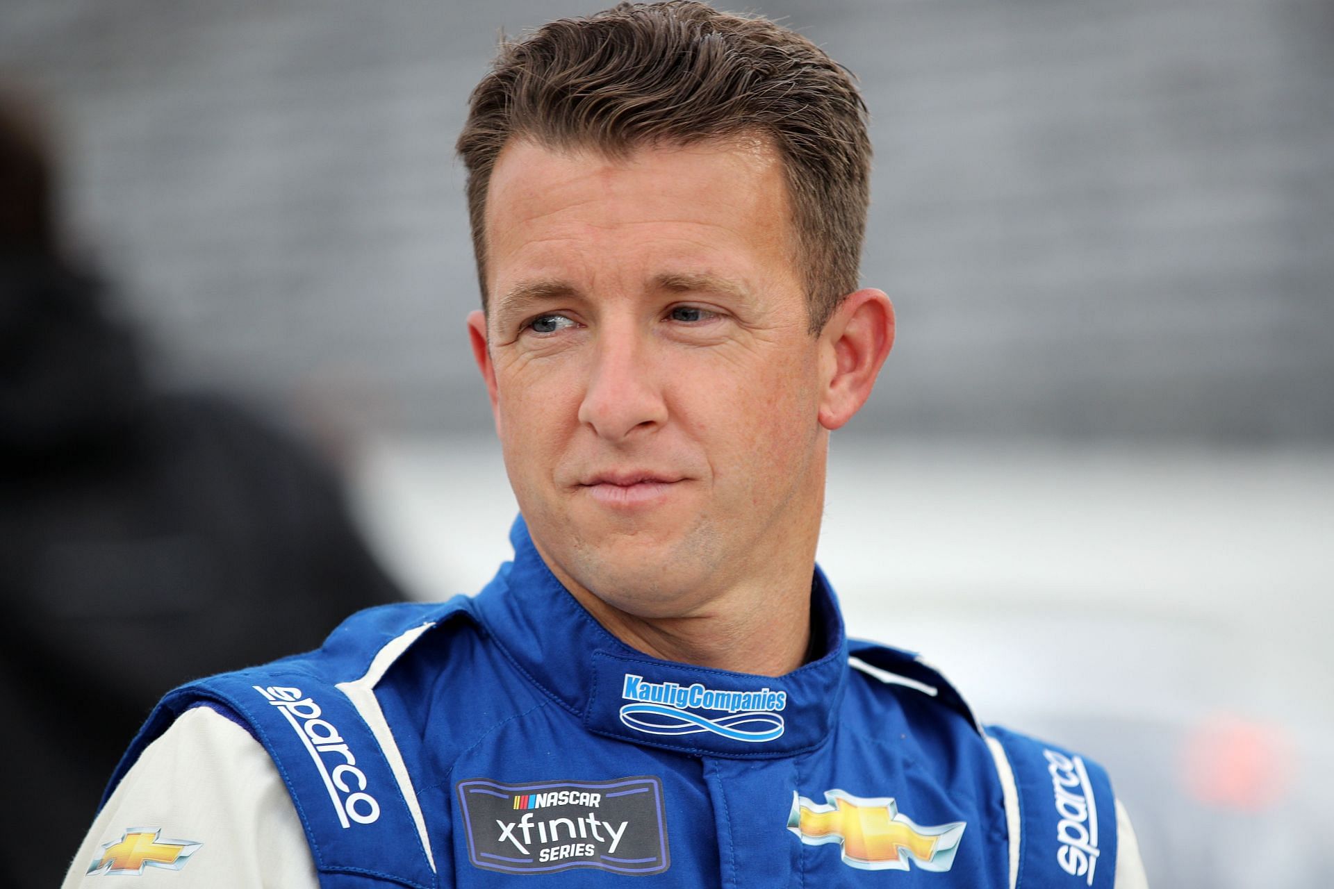 AJ Allmendinger waits on the grid during qualifying for the NASCAR Xfinity Series Call 811 Before You Dig 250 powered by Call 811.com at Martinsville Speedway. (Photo by Meg Oliphant/Getty Images)