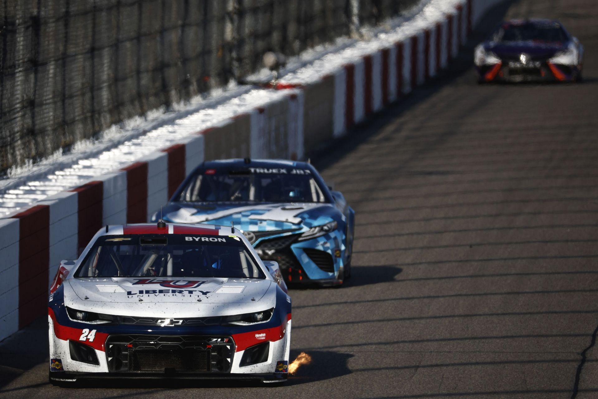 William Byron drives with flames during the NASCAR Cup Series Toyota Owners 400 at Richmond Raceway. (Photo by Jared C. Tilton/Getty Images)