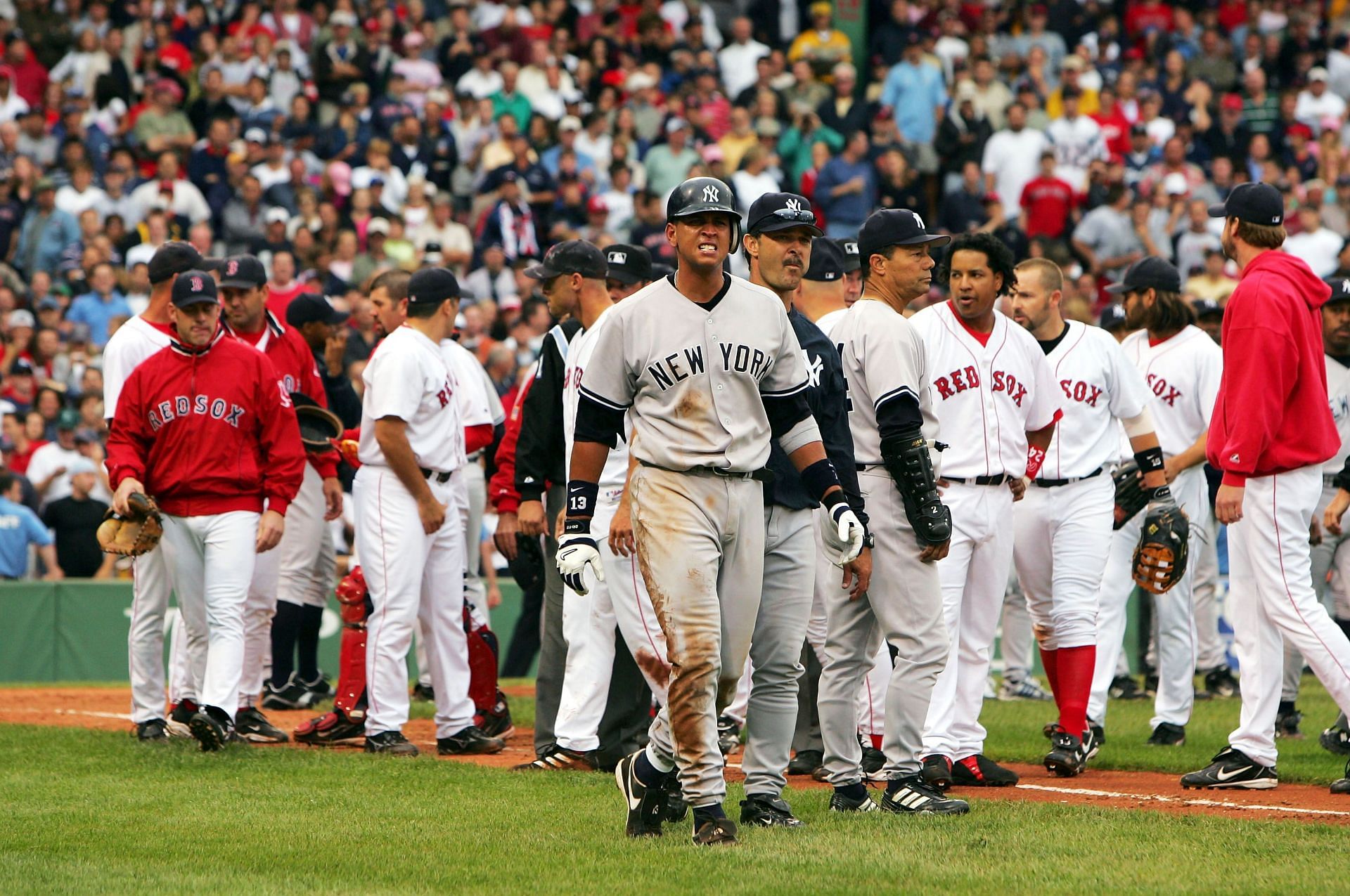 Alex Rodriguez walks to base after a fight with the Red Sox