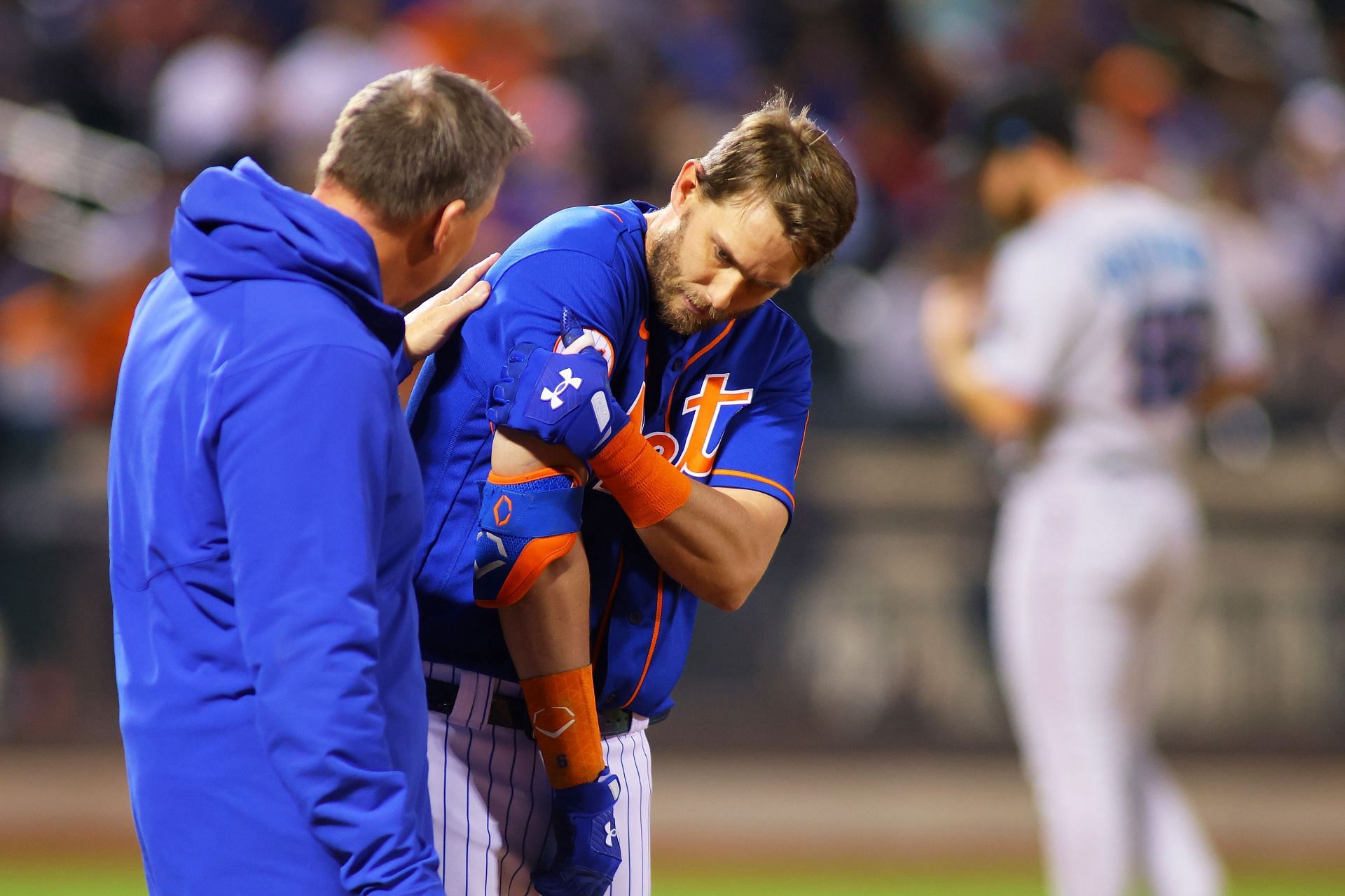 Jeff McNeil of the New York Mets reacts after getting hit by a pitch against the Miami Marlins.