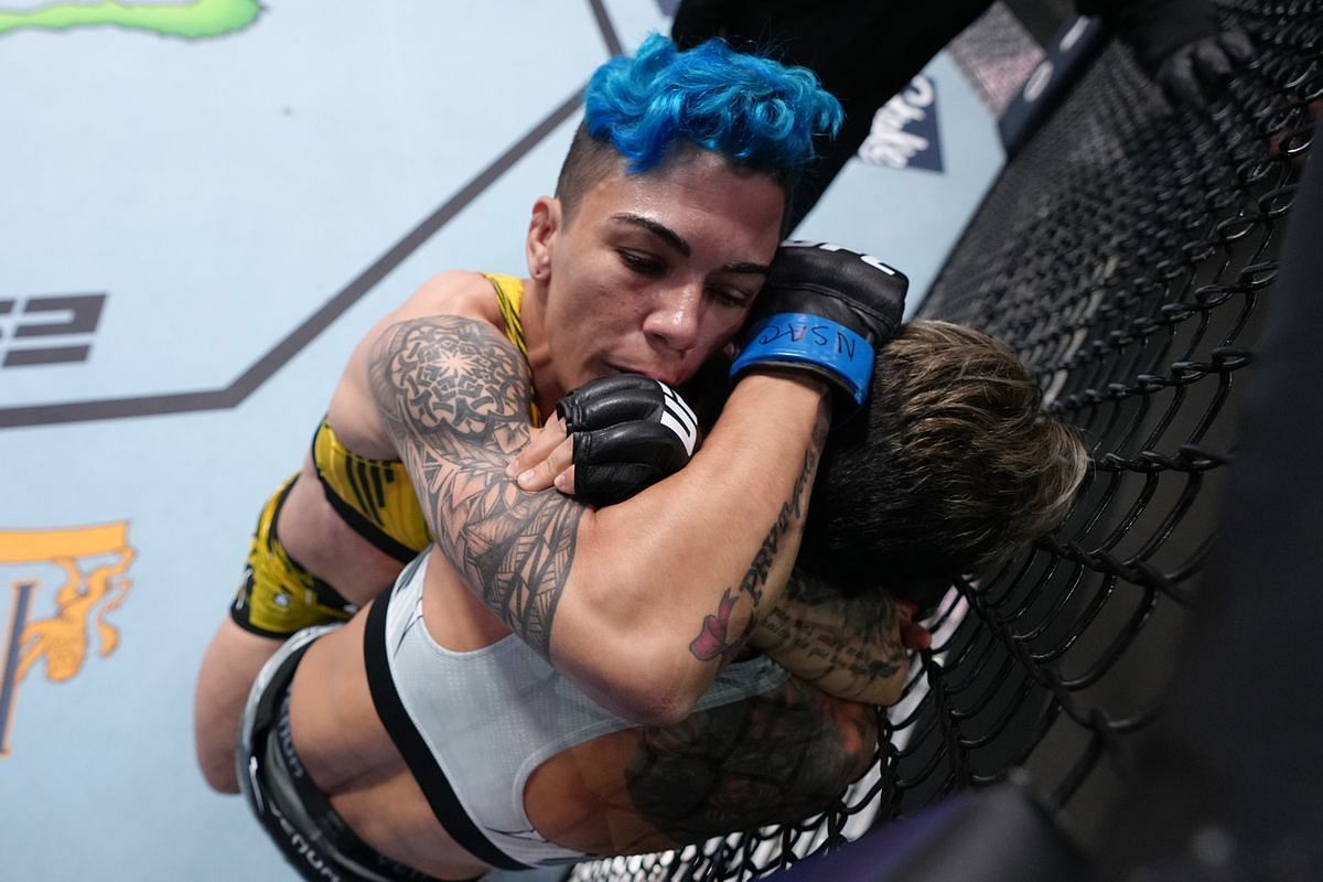 Jessica Andrade locked up a rare standing arm triangle choke to submit Amanda Lemos