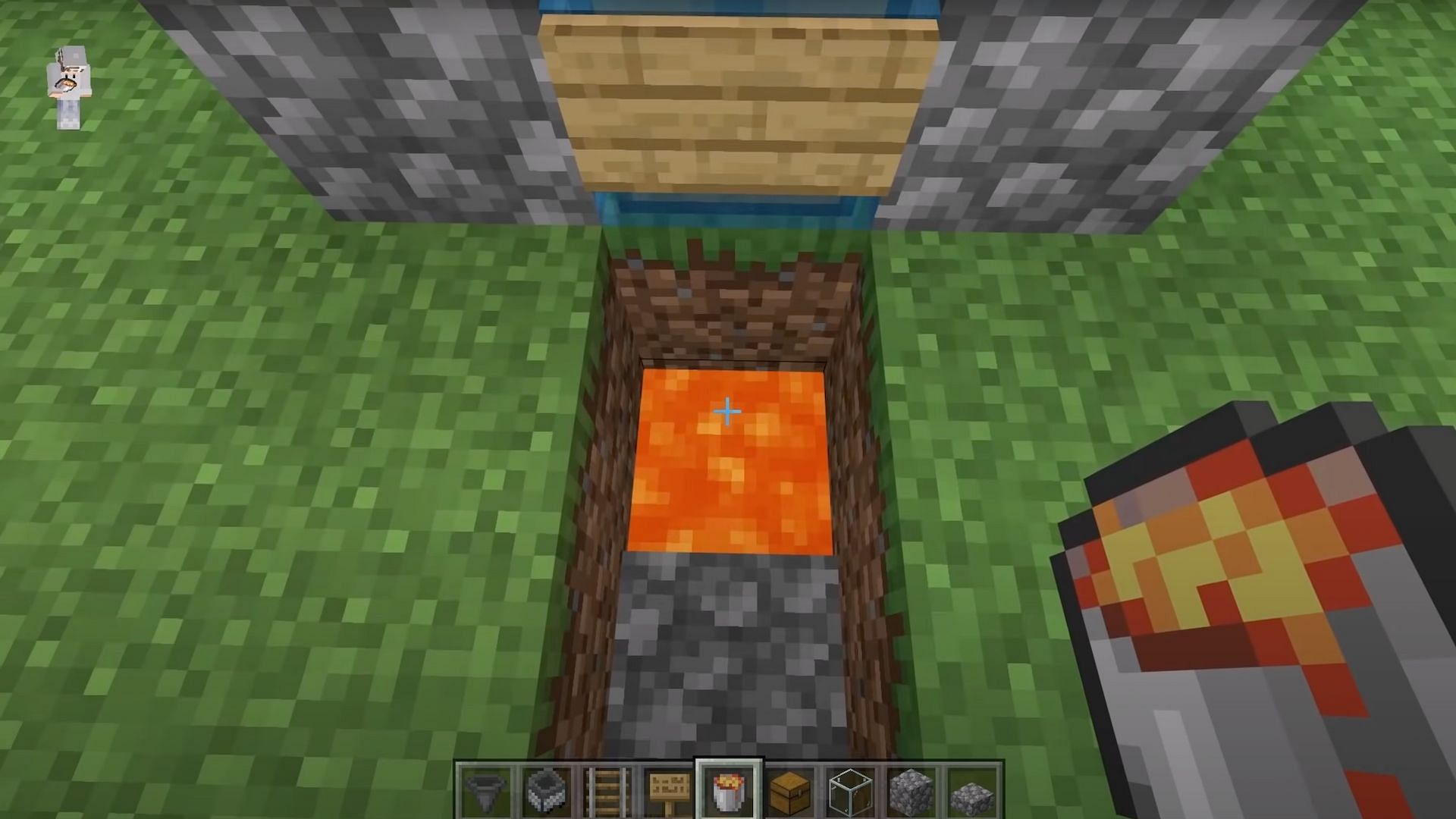 Players should pour the lava on top of the minecart with hopper (Image via JC Playz/YouTube)