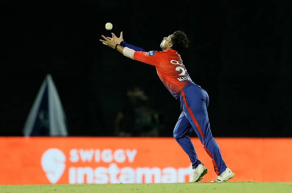 Kuldeep Yadav took an excellent catch off his own bowling to dismiss Umesh Yadav [P/C: iplt20.com]