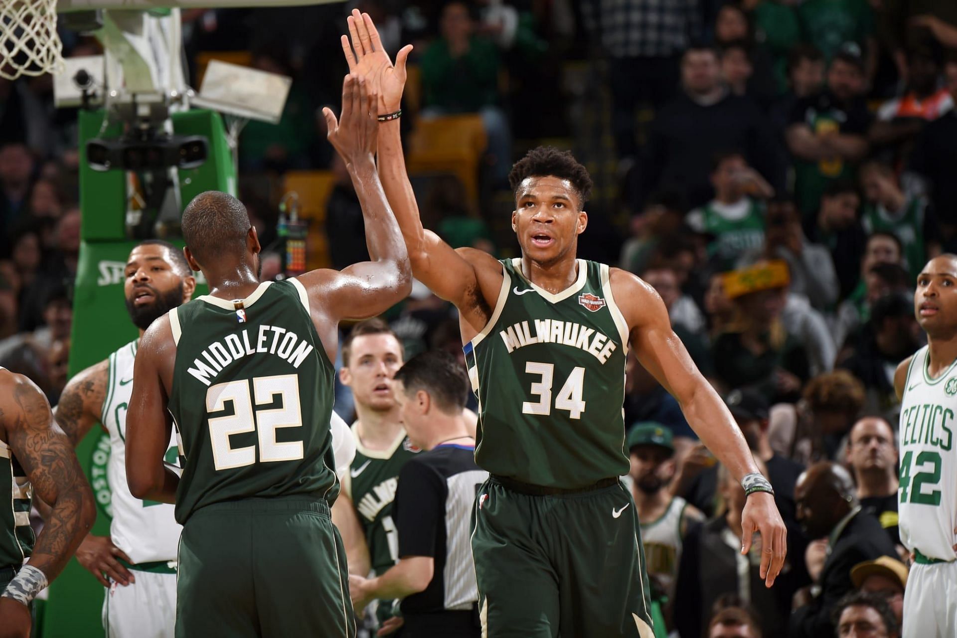 Khris Middleton, left, and Giannis Antetokounmpo