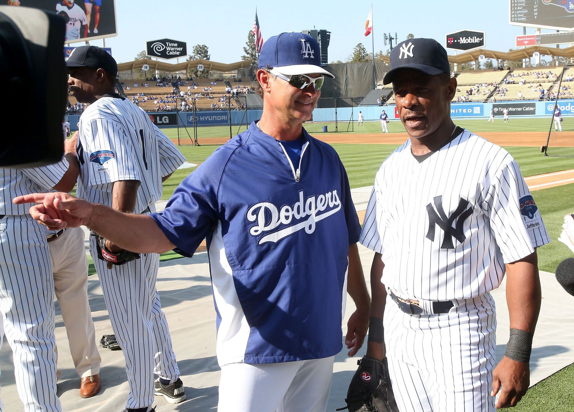 Former New York Yankees Rickey Henderson (R) and Don Mattingly (L), who is currently the Los Angeles Dodgers manager, before an MLB Old Timer&#039;s game