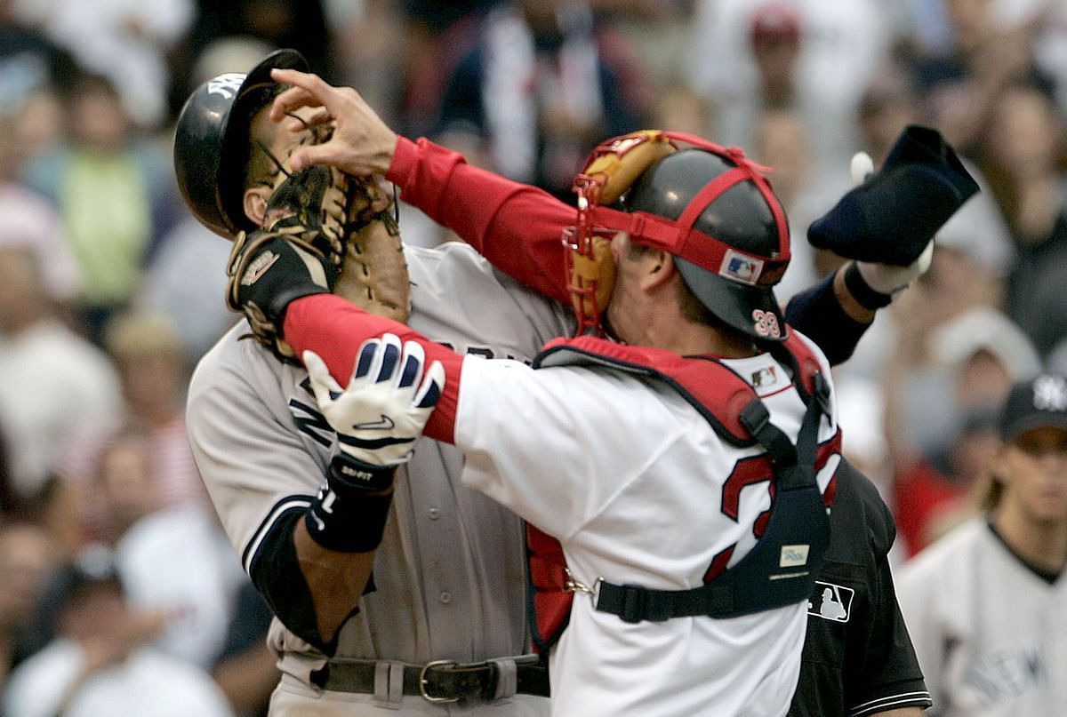 Alex Rodriguez (left) and Jason Varitek (right) engage in one of the most well known baseball brawls of all time.