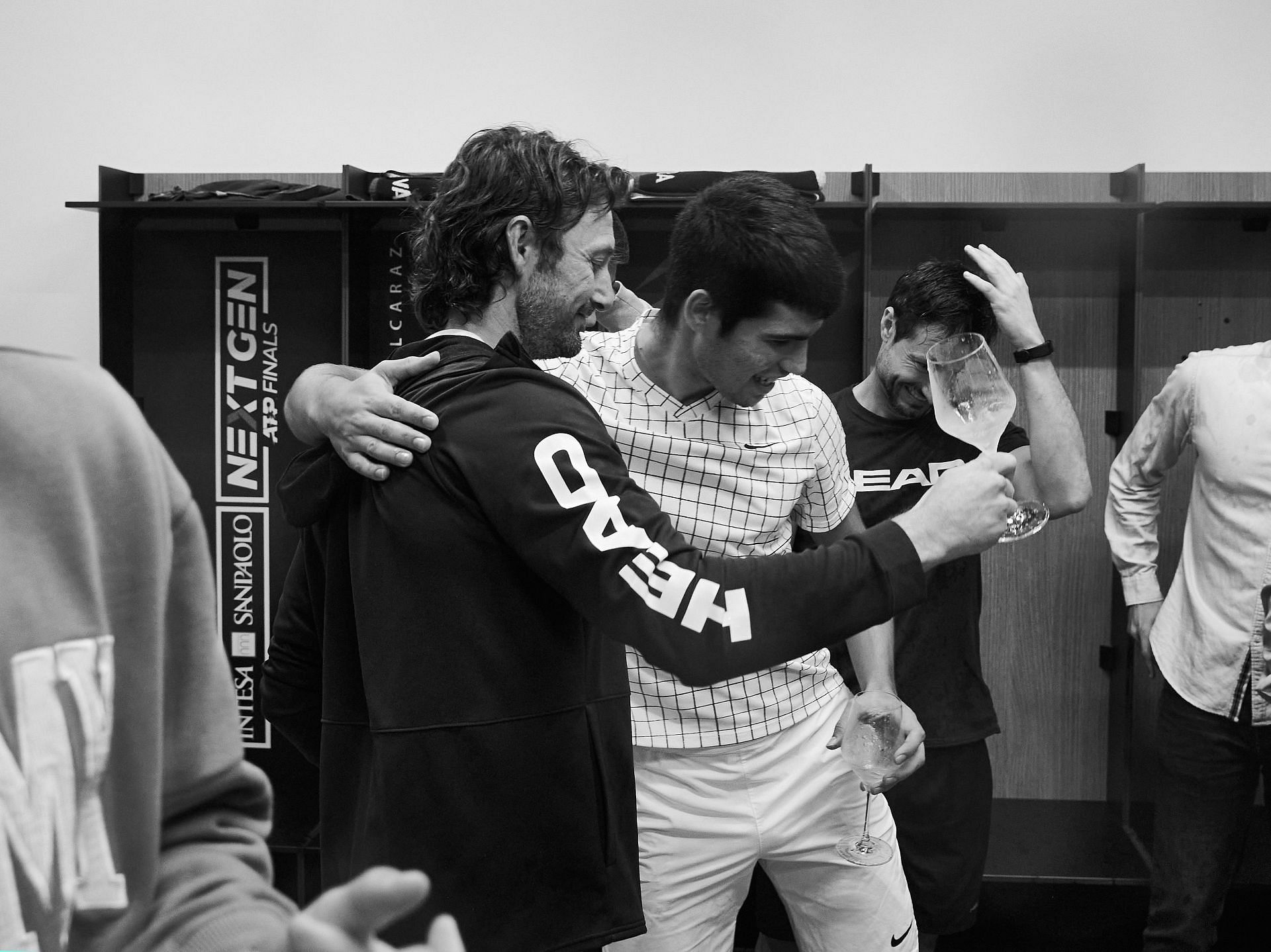 Juan Carlos Ferrero and Carlos Alcaraz celebrate after Next Gen ATP Finals