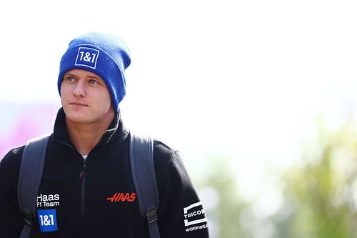 Mick Schumacher walks in the Paddock before practice ahead of the F1 Grand Prix of Emilia Romagna (Photo by Mark Thompson/Getty Images)