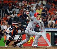 ICYMI: Texas Rangers right fielder Kole Calhoun humorously tries to prevent reigning MVP Shohei Ohtani from reaching the dugout