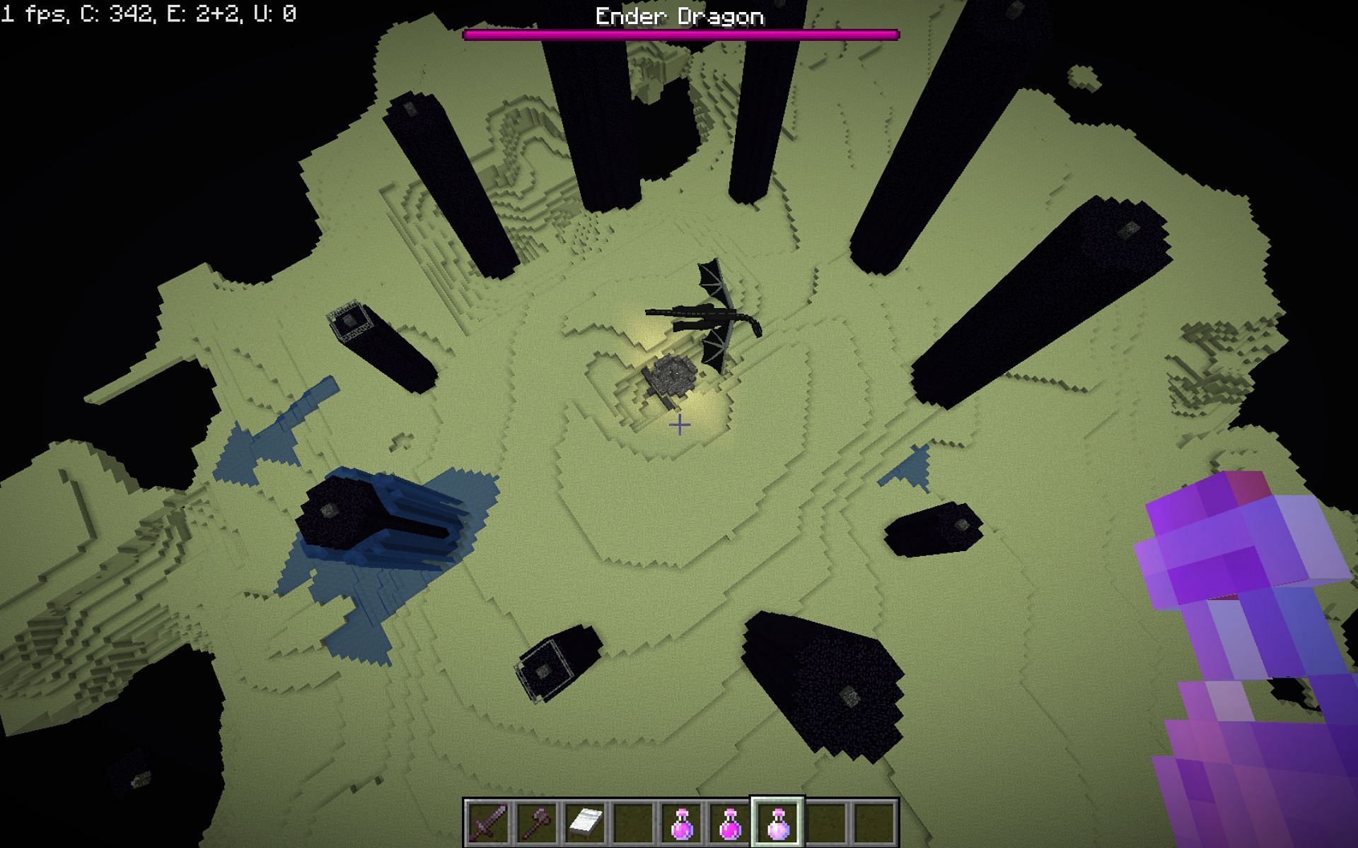 Ender Dragon battle in the End realm (Image via Minecraft)