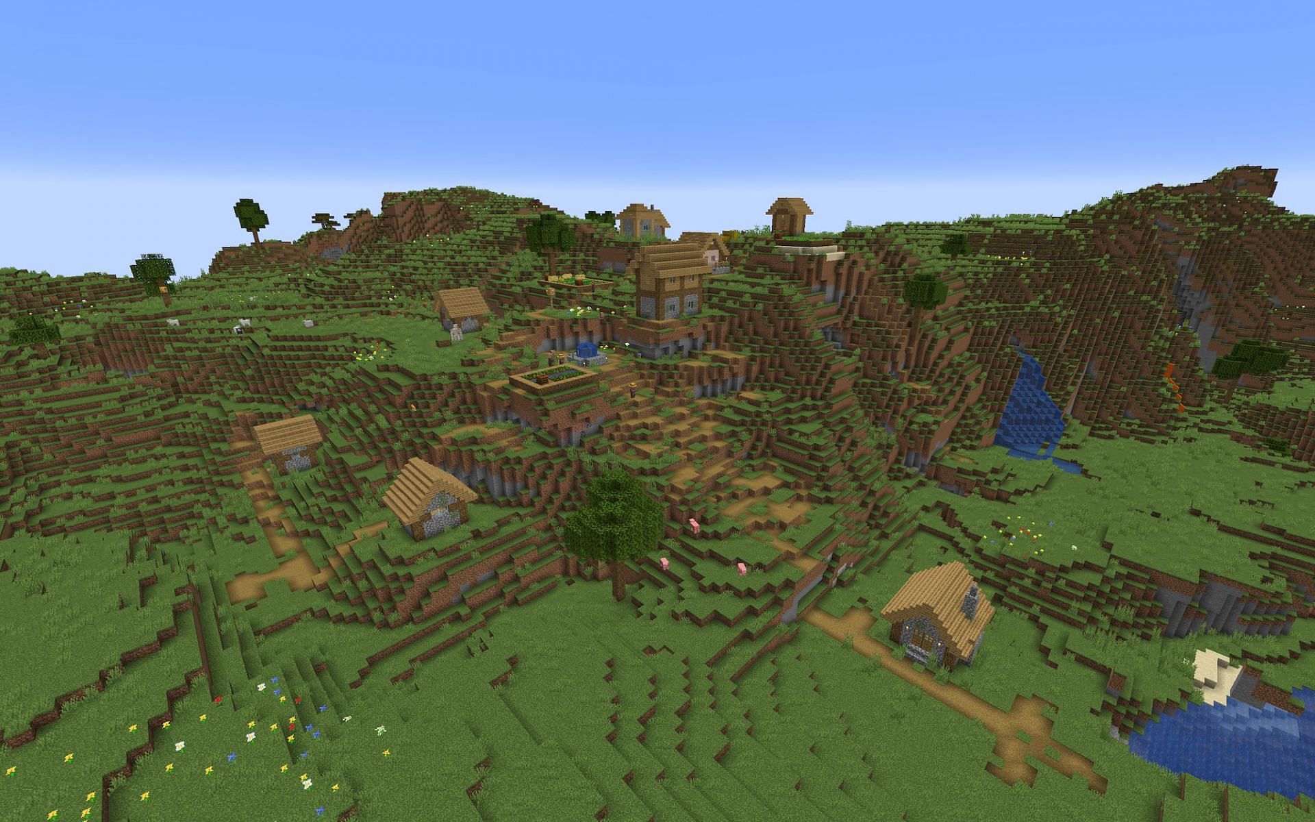 A village on a hill [Image via Minecraft]