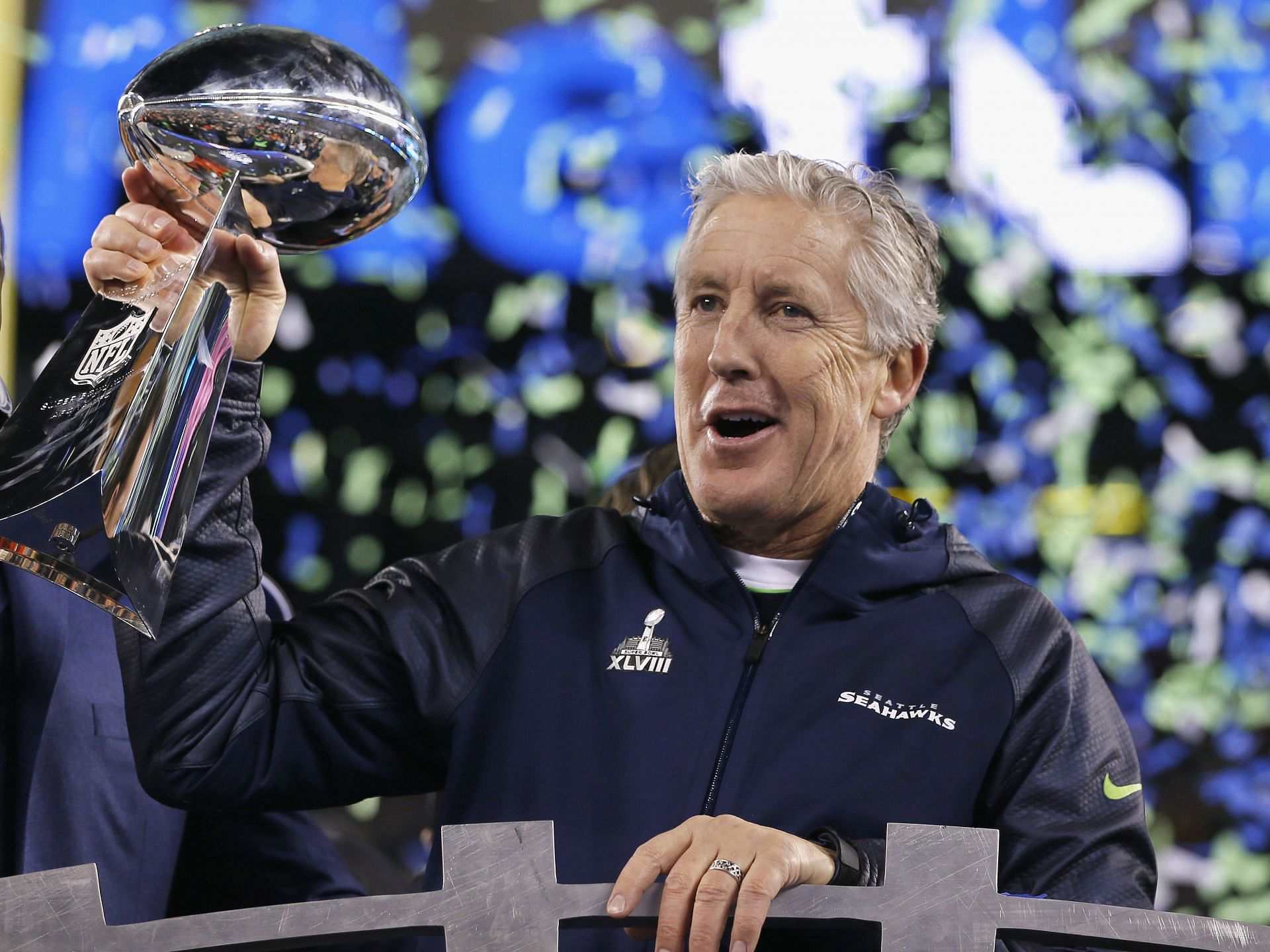 Pete Carroll lifting the Vince Lombardi trophy after winning Super Bowl XLVIII with Seattle Seahawks