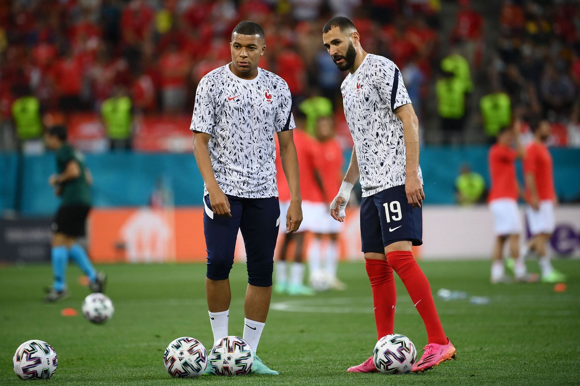 Karim Benzema wants to play alongside Kylian Mbappe (left) at the Santiago Bernabeu.