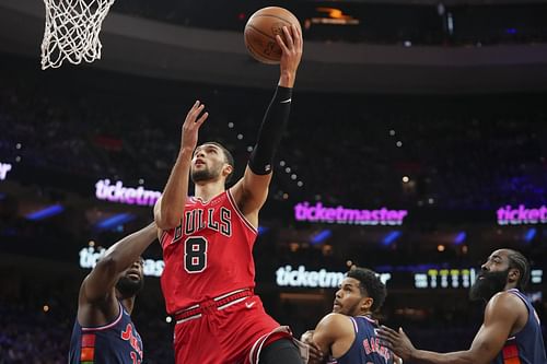 Zach LaVine #8 of the Chicago Bulls shoots the ball against Joel Embiid #21 of the Philadelphia 76ers in the first half at the Wells Fargo Center on March 7, 2022 in Philadelphia, Pennsylvania.