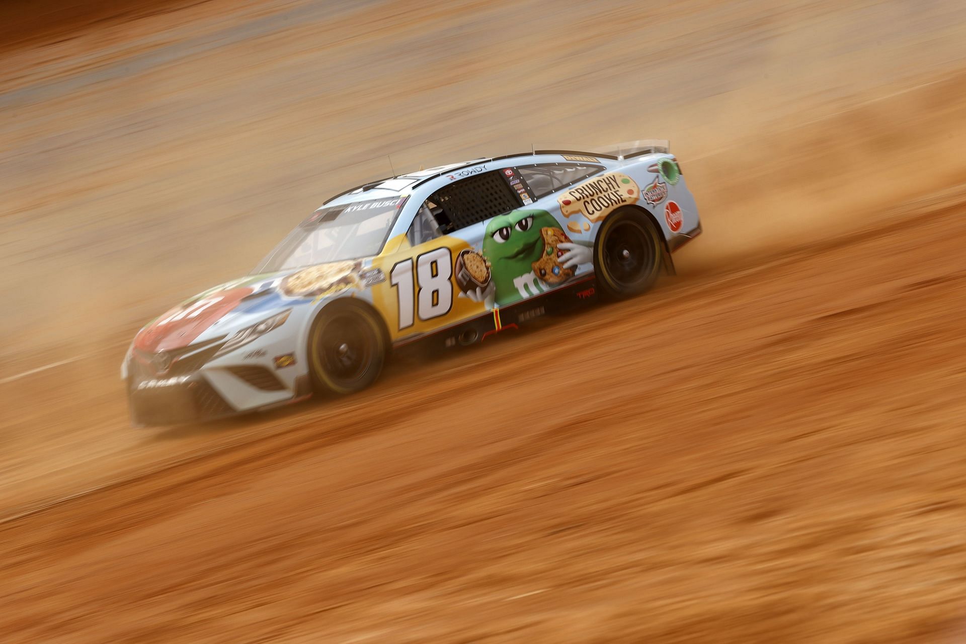 Kyle Busch drives during final practice for the NASCAR Cup Series Food City Dirt Race at Bristol Motor Speedway.