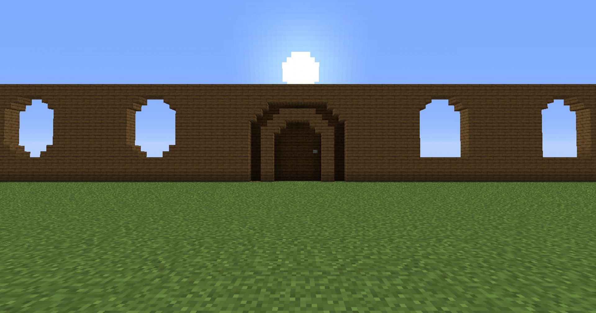 Walls, oval-shaped windows, and a massive door built up for a mansion (Image via u/OcarinaOfTime42/Reddit)