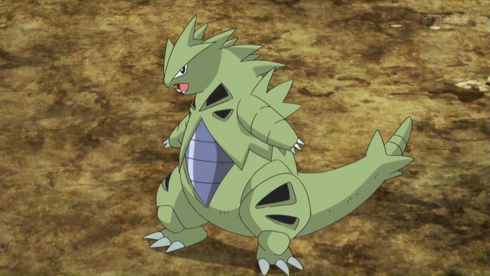 Beberapa pelatih akan dibutuhkan untuk mengalahkan bos terkemuka seperti Tyranitar (Gambar via The Pokemon Company)