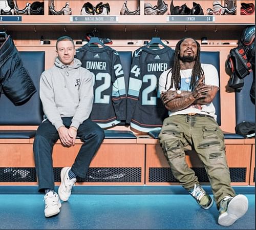 Seattle-born rapper Macklemore with Marshawn Lynch. Source: Front Office Sports