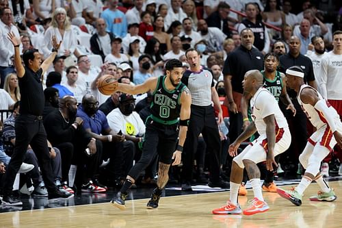 Jayson Tatum driving in against PJ Tucker and Jimmy Butler