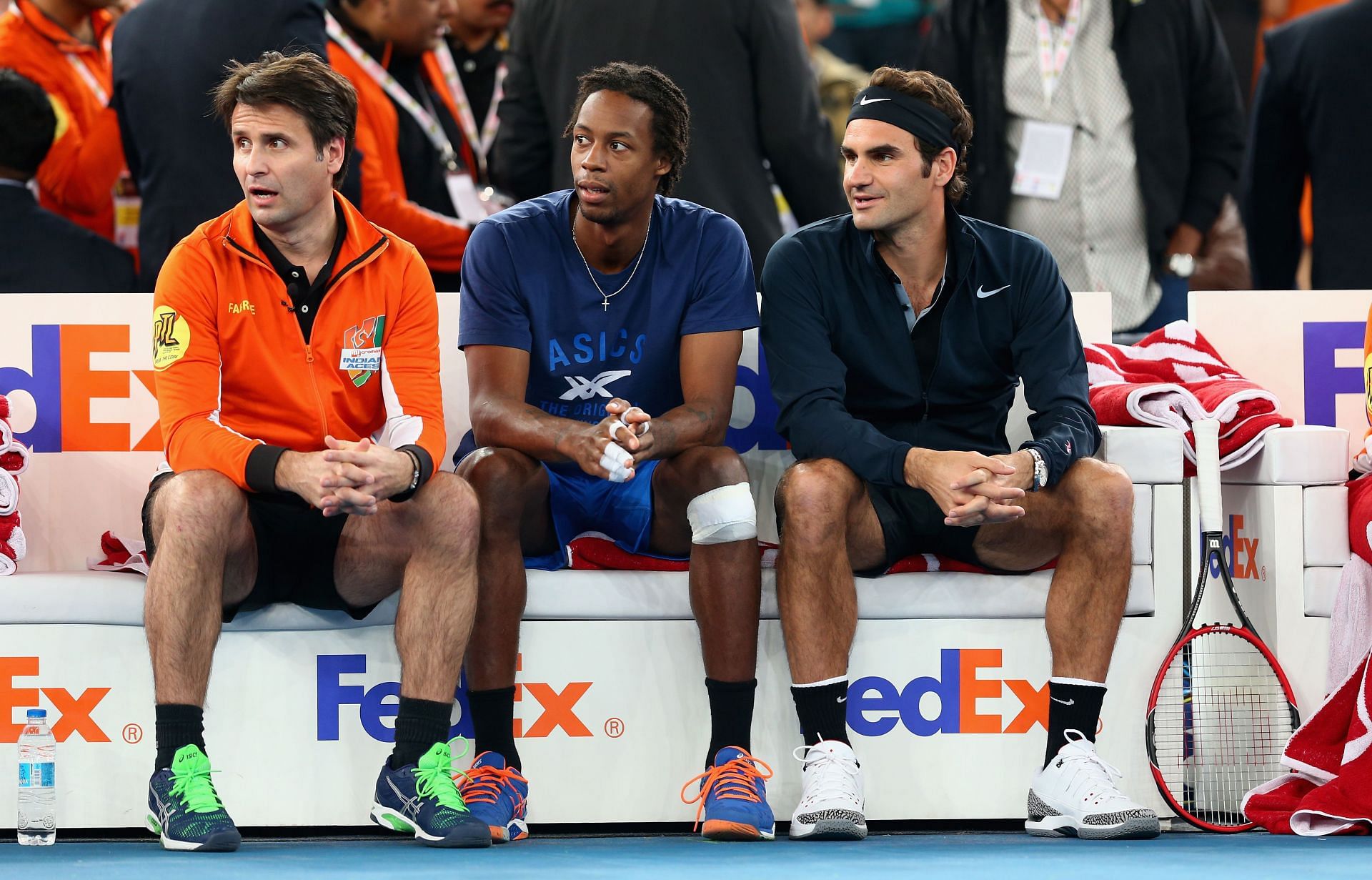 Santoro (left) with Monfils and Federer(right) at the International Premier Tennis League in India
