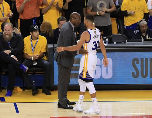 Mike Brown and Steph Curry during the Warriors' 2017 NBA Finals - Game One