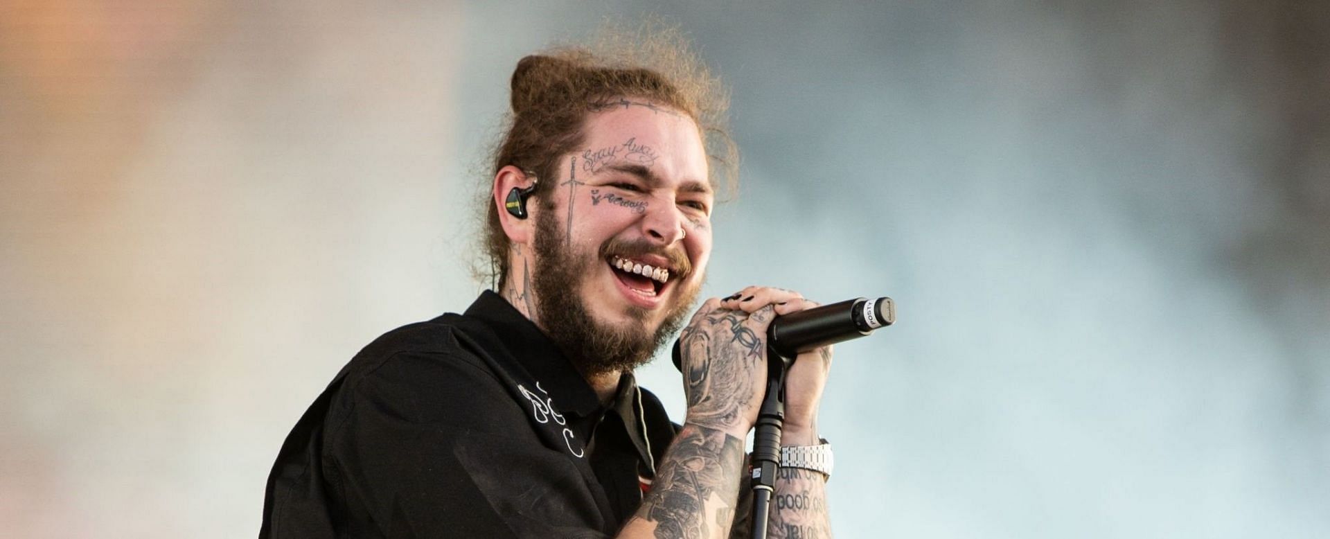 Post Malone was raised by his father, Richard Post and his stepmother Jodie (Image via Lorne Thomson/Getty Images)