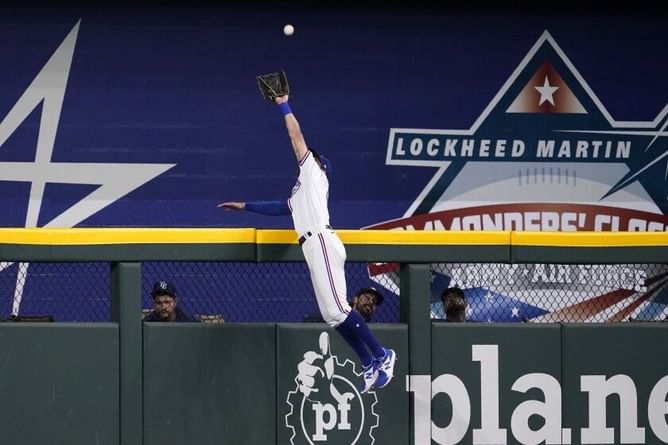 "I keep watching this catch and I really think it's better than Trout's" "This will get your blood pumping!" - Baseball world reacts to Texas Rangers outfielder Eli White's insane catch to rob a home run