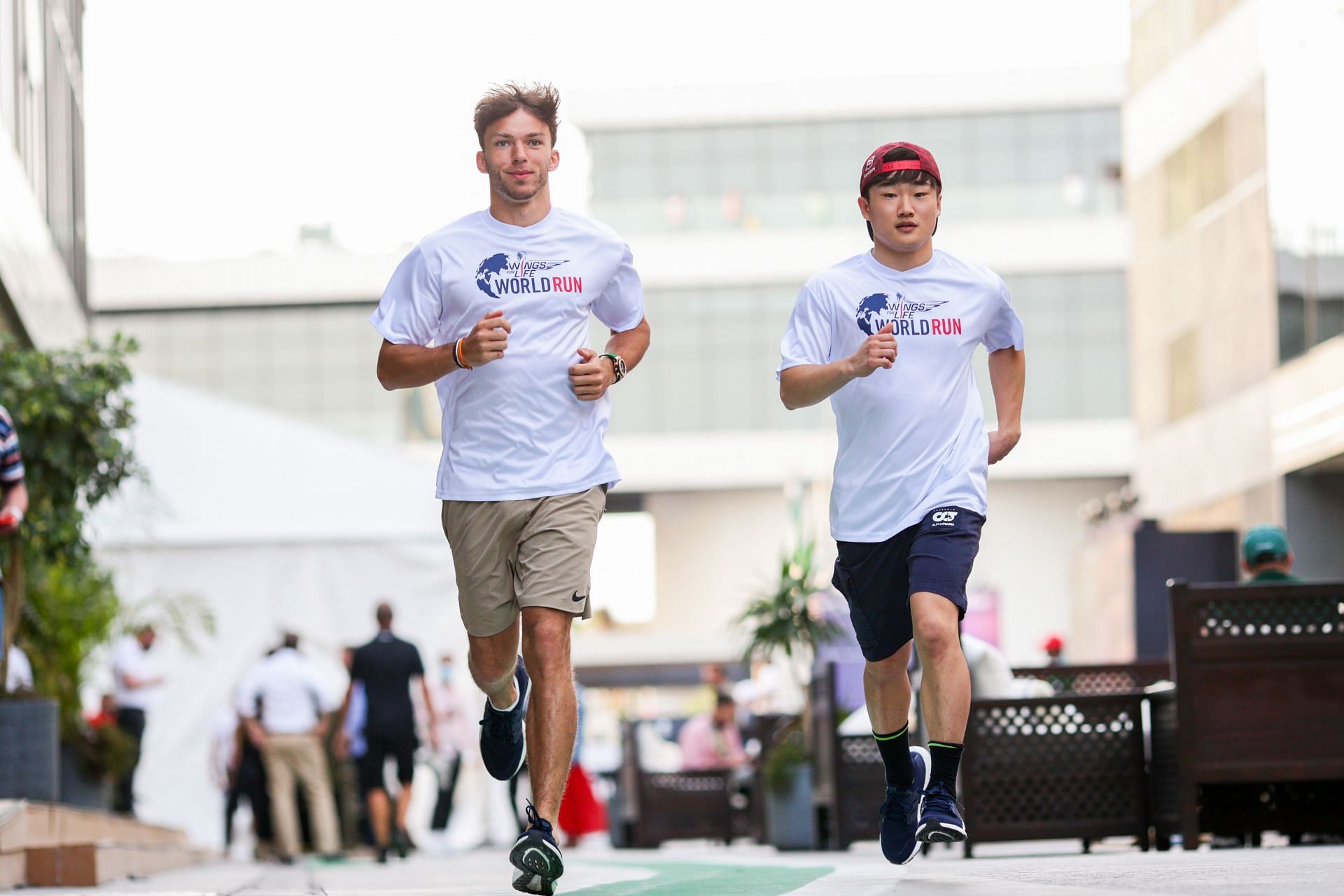 AlphaTauri drivers Pierre Gasly (left) and Yuki Tsunoda (right) ahead of the 2022 F1 Saudi Arabian GP (Photo by Peter Fox/Getty Images)