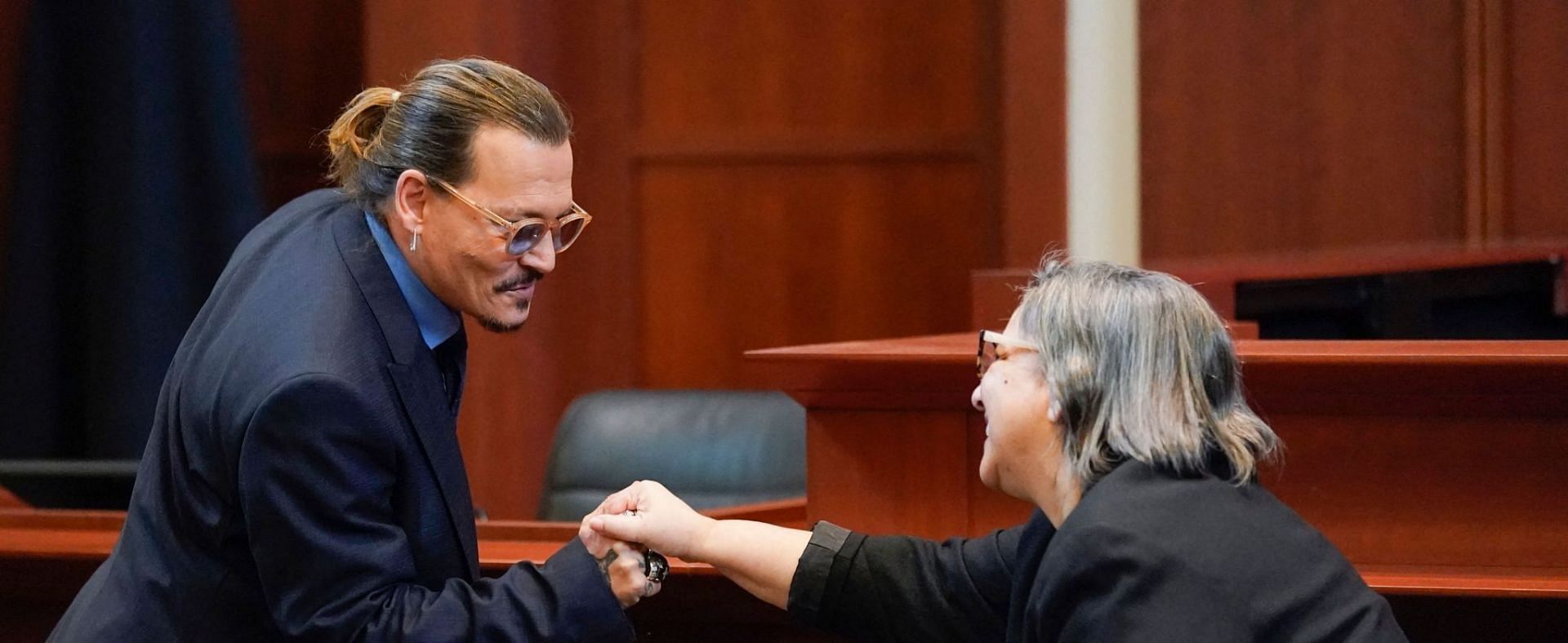 Johnny Depp and Stenographer Judy&#039;s moments wins hearts online (Image via Getty Images)