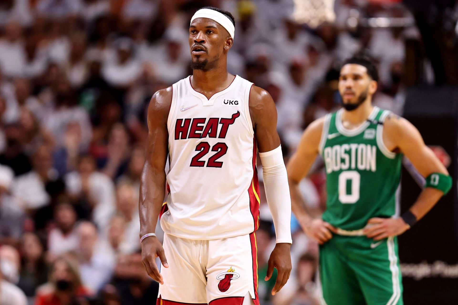 Jimmy Butler of the Miami Heat looks on ahead of Jayson Tatum of the Boston Celtics in Game 1 of the 2022 Eastern Conference finals.