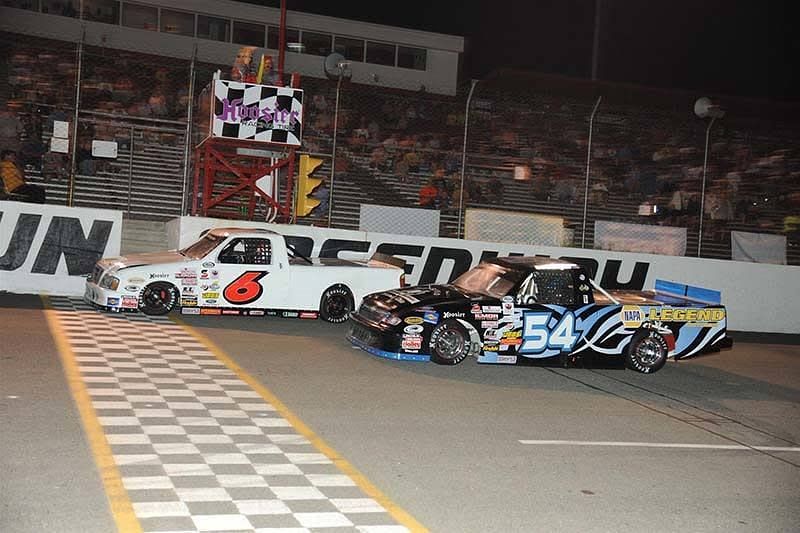 Car No 6 and Car no 54 racing Jennerstown Speedway