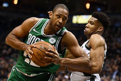 Al Horford and Giannis Antetokounmpo in action during Boston Celtics v Milwaukee Bucks - Game Three