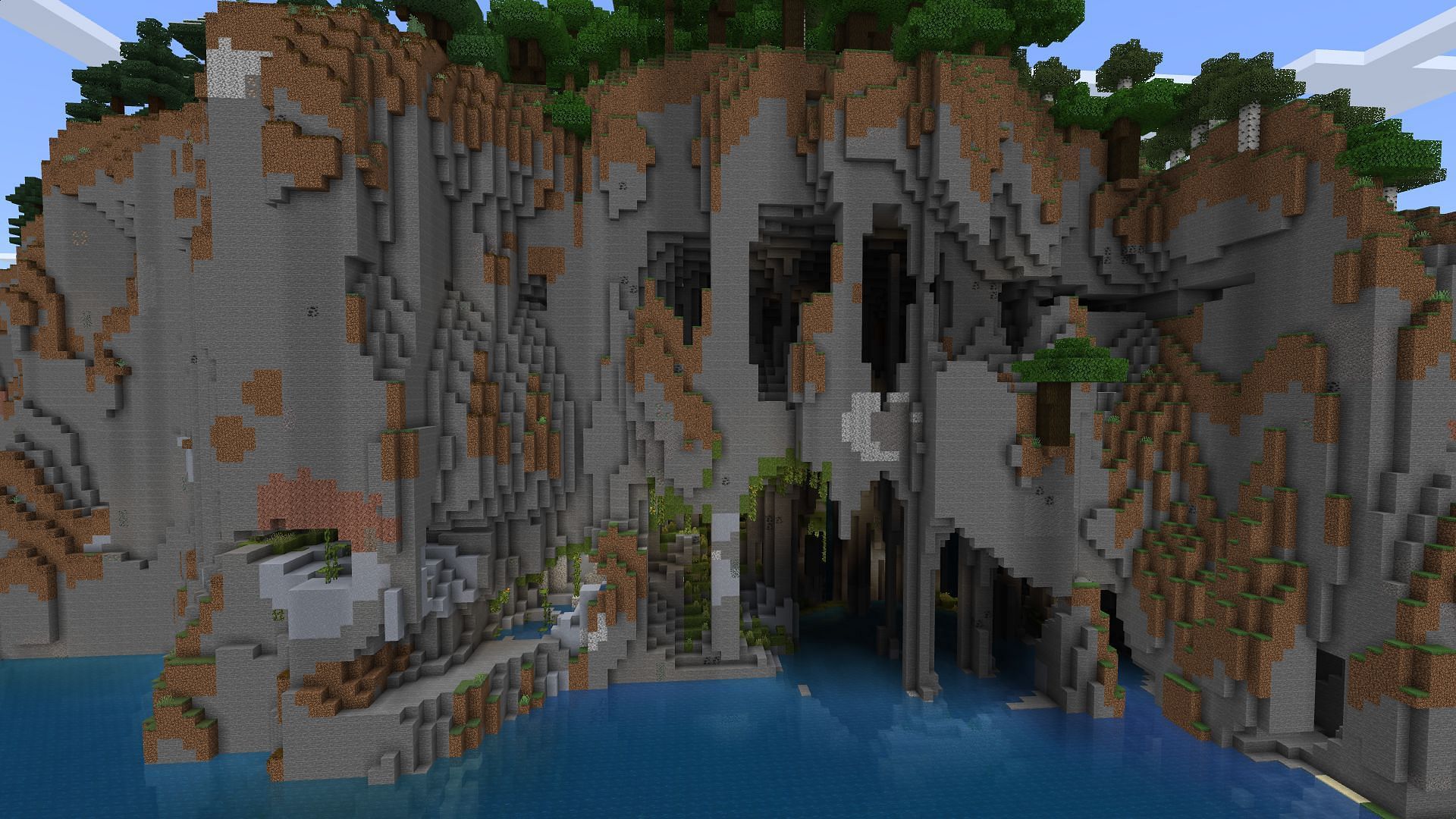 The cliffside exposed lush cave found at spawn (Image via Minecraft)