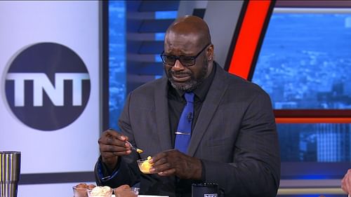 Shaquille O'Neal trying to eat some vegan ice cream. (Photo: NBA.com)