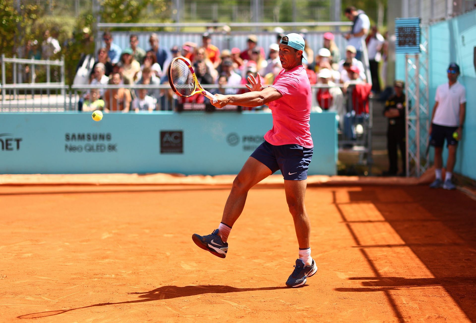 Rafael Nadal strikes a forehand during practice in Madrid.