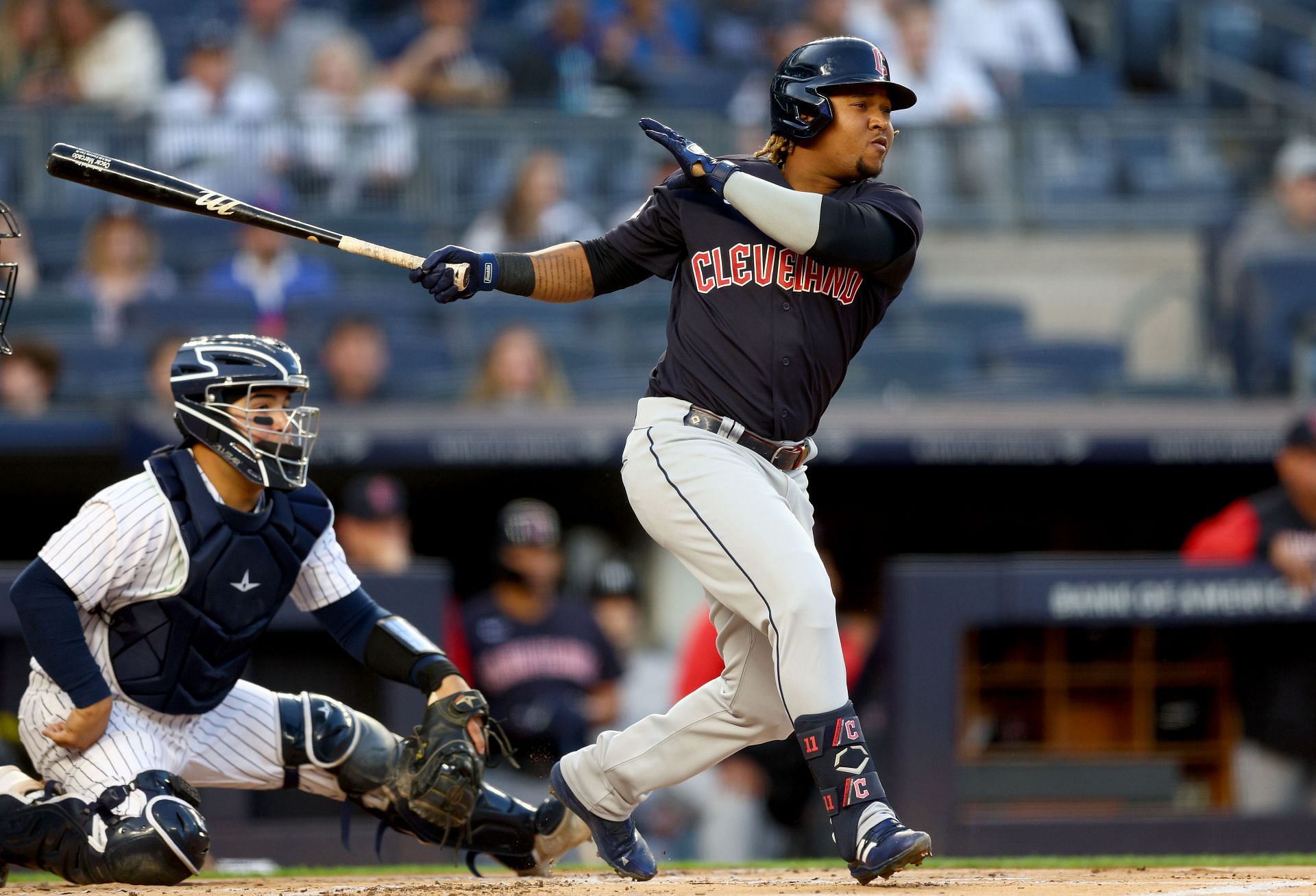 Jose Ramirez of the Cleveland Guardians gets a hit.