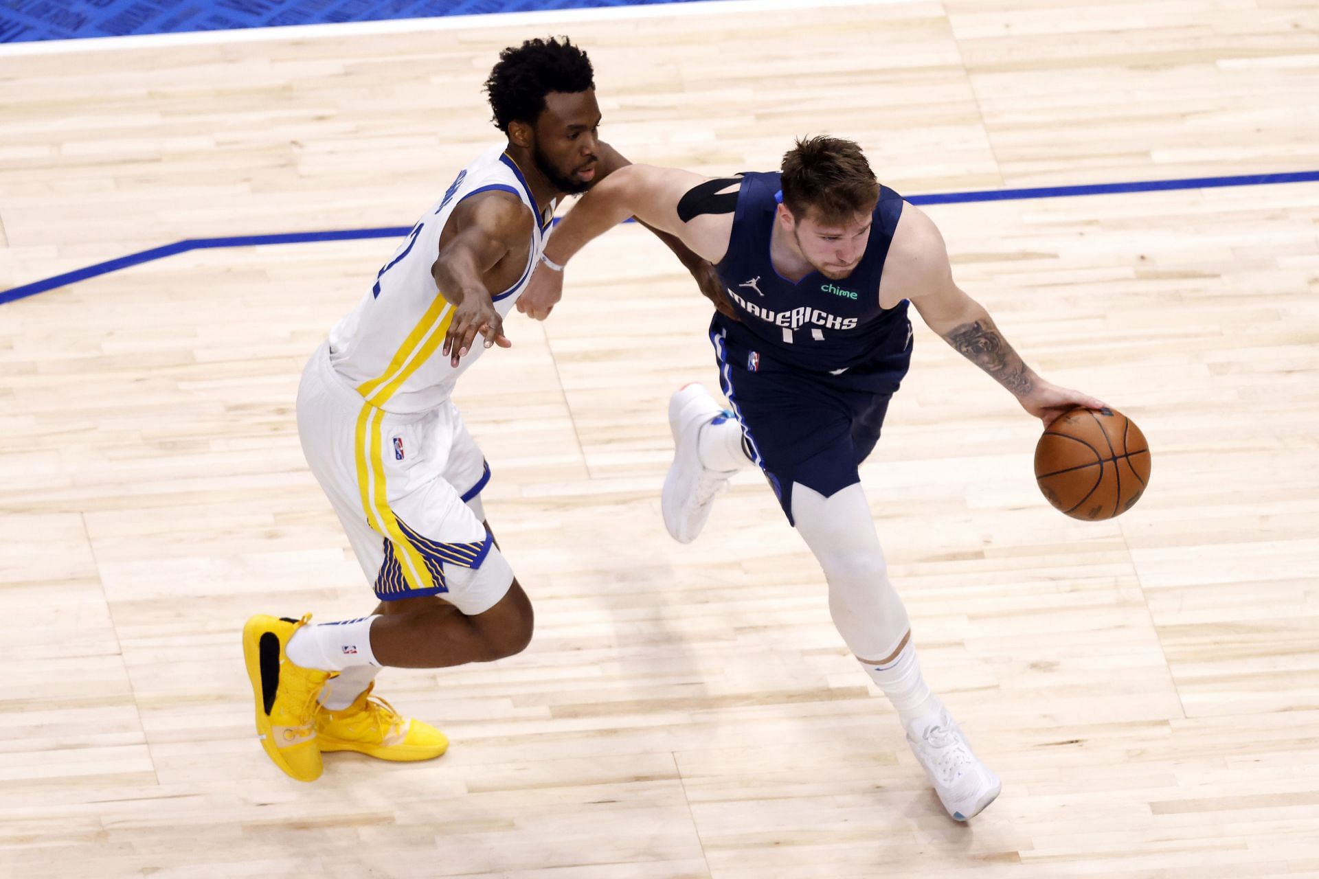 Andrew Wiggins guarding Luka Doncic