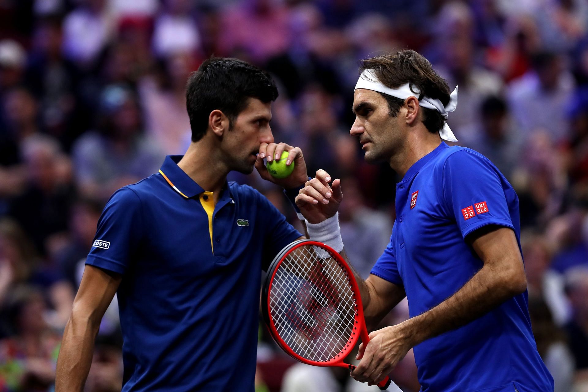Novak Djokovic and Roger Federer in doubles action at the 2018 Laver Cup