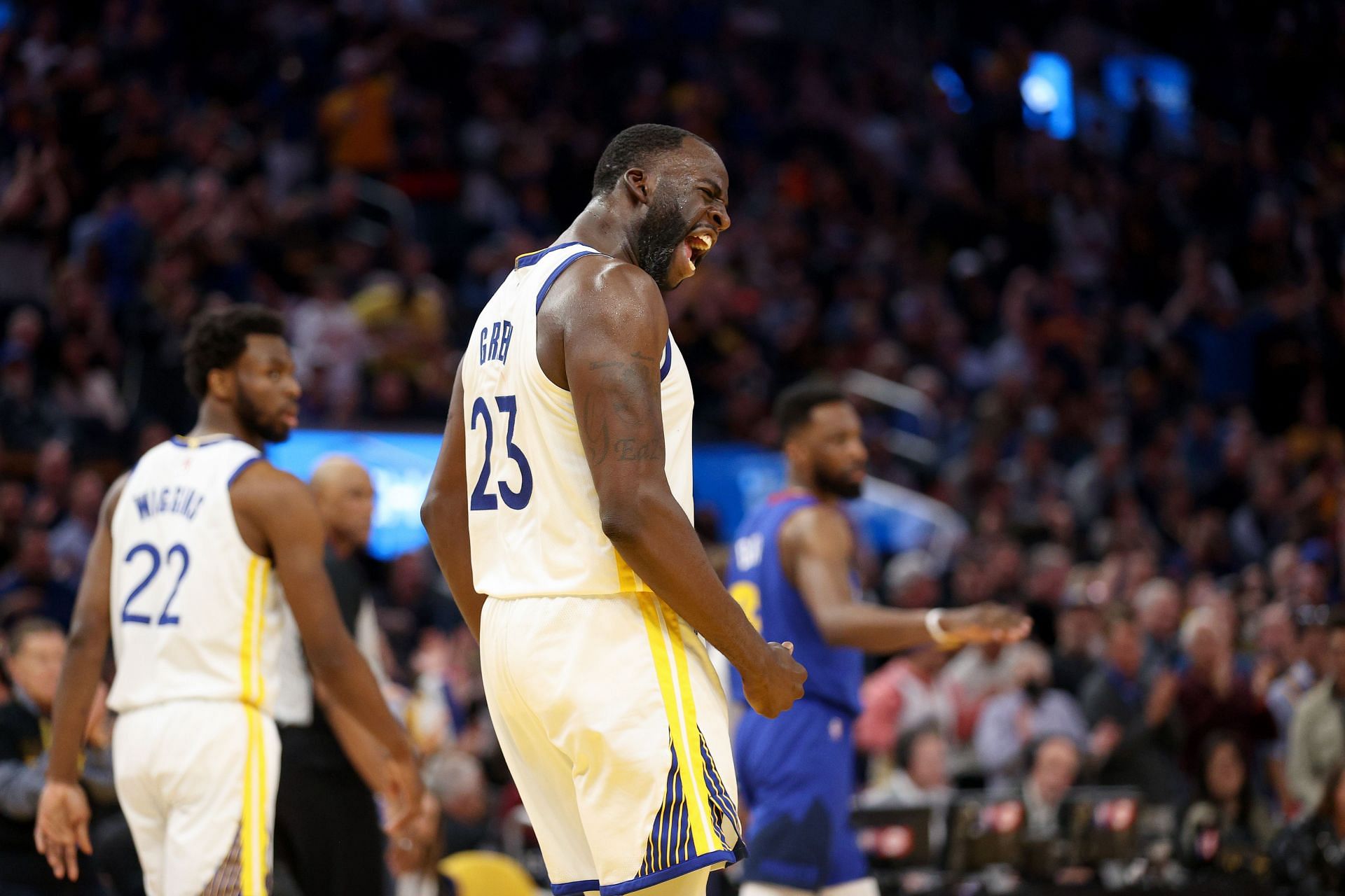 Draymond Green #23 of the Golden State Warriors reacts after he drew an offensive foul on Aaron Gordon #50 of the Denver Nuggets in the first half during Game Two of the Western Conference First Round NBA Playoffs at Chase Center on April 18, 2022 