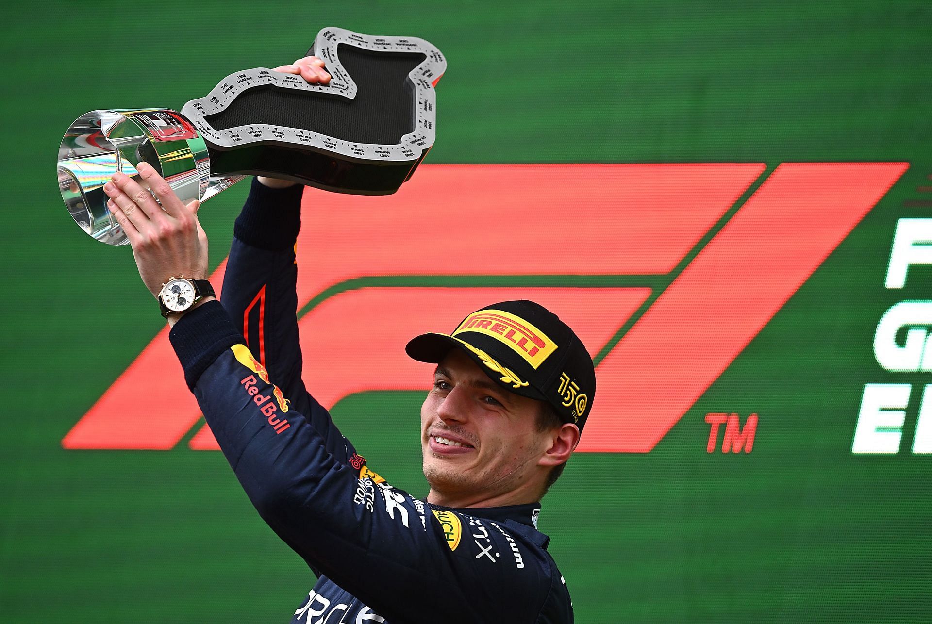 Max Verstappen celebrates his win on the podium at the 2022 F1 Imola GP (Photo by Clive Mason/Getty Images)