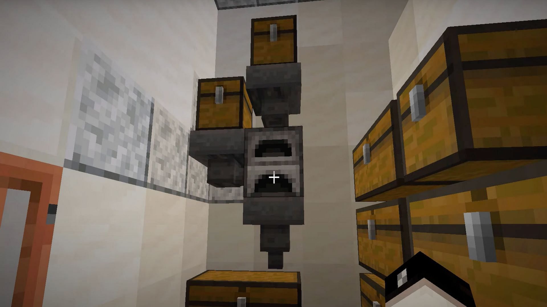 Une trémie est idéale pour déplacer des objets dans Minecraft (Image via Mojang Studios || HTG George/YouTube)